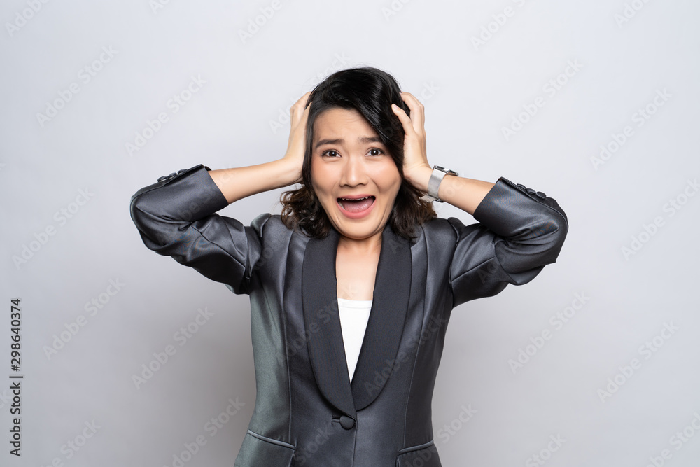 Woman feel scared standing isolated over white background Woman feel scared standing isolated over white background