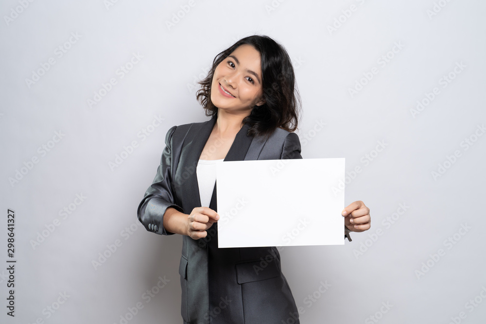 Business woman showing paper isolated over white background Business woman showing paper isolated over white background