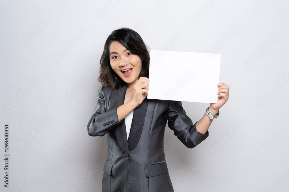 Business woman showing paper isolated over white background Business woman showing paper isolated over white background