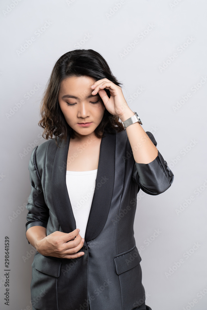 Portrait of a confident woman standing isolated over background Portrait of a confident woman standing isolated over background