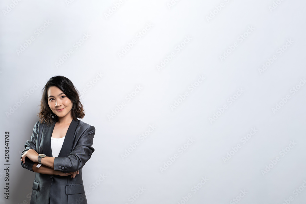 Happy woman thinking and standing isolated over white background Happy woman thinking and standing isolated over white background