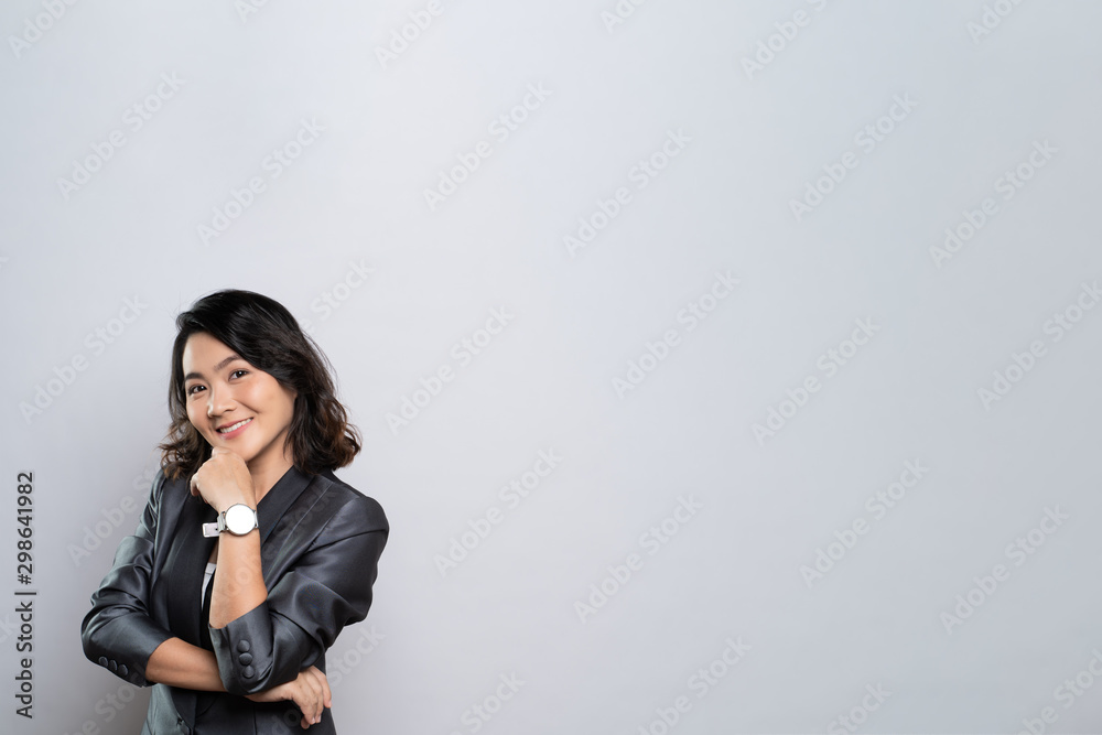 Happy woman thinking and standing isolated over white background Happy woman thinking and standing isolated over white background