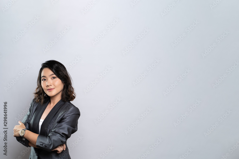 Happy woman thinking and standing isolated over white background Happy woman thinking and standing isolated over white background