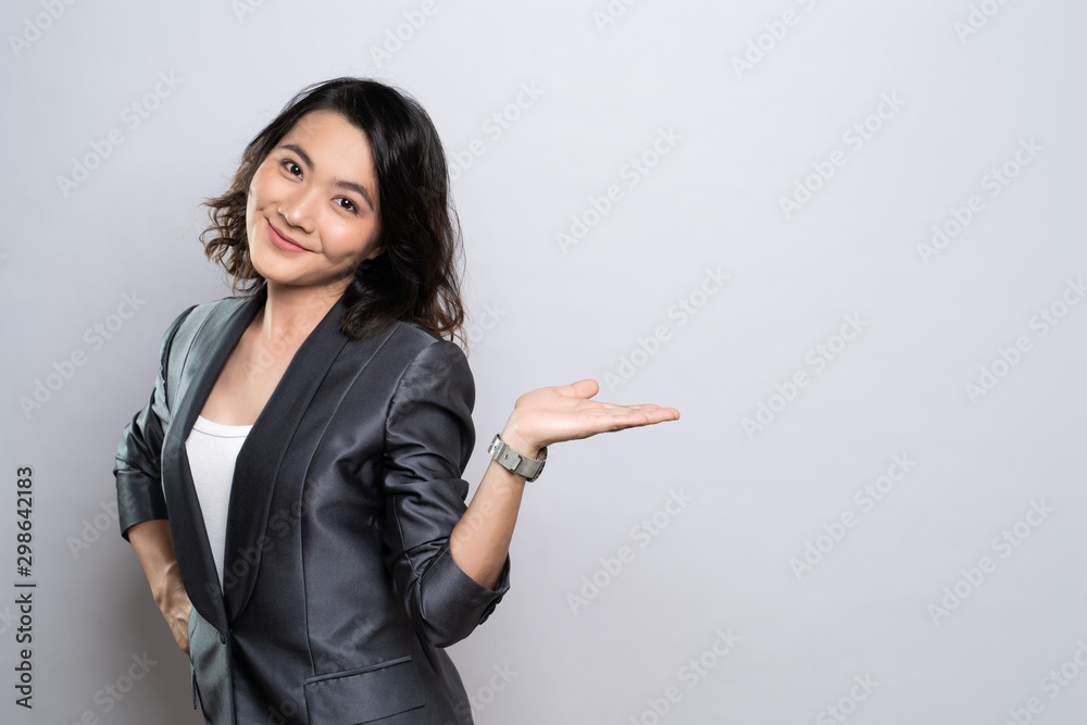 Happy woman present the copy space isolated over white background Happy woman present the copy space isolated over white background