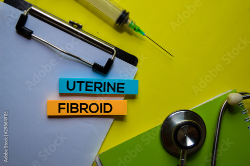 Uterine Fibroid on top view yellow table. Healthcare/medical concept.