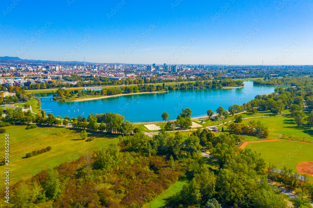 Aerial drone view of beautiful Jarun lake, sunny summer day, Zagreb, Croatia
