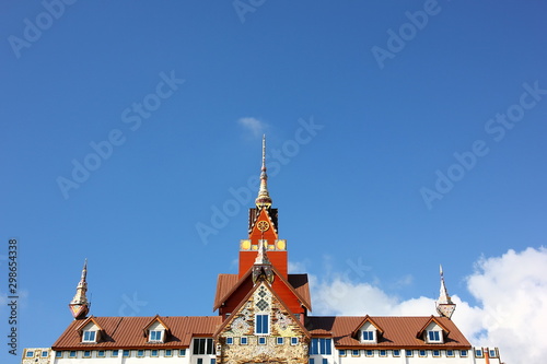 the beautiful Thai roof applied style with blue sky white cloud