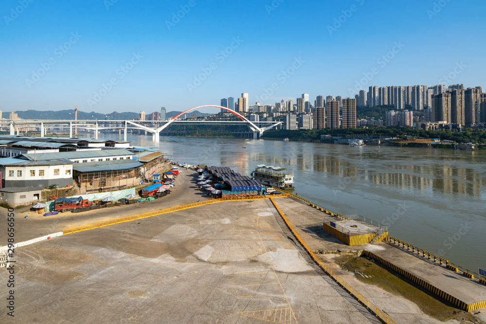 Terminal warehouse and modern city skyline in Chongqing, China