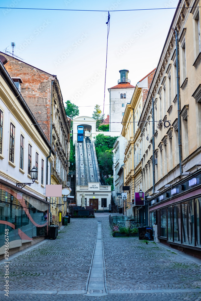 Funicular and medieval Lotrscak tower in Zagreb, Croatia in early summer morning, popular touristic destination