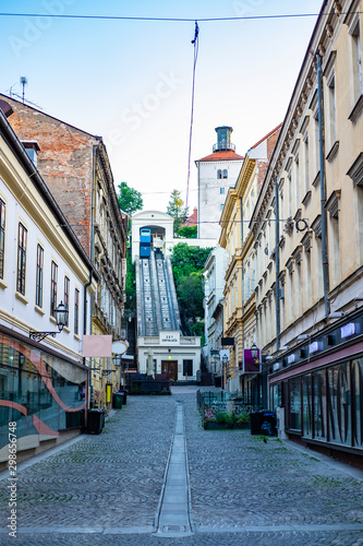 Fototapeta Naklejka Na Ścianę i Meble -  Funicular and medieval Lotrscak tower in Zagreb, Croatia in early summer morning, popular touristic destination