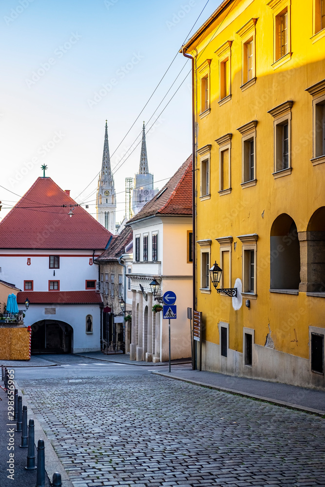 View on Stone gate and Zagreb cathedral with lantern and blue summer sky, Croatia, popular touristic destination