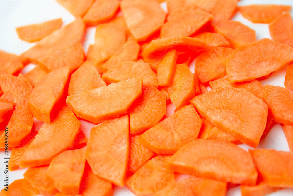 Slices of fresh ripe carrots on a white background isolate Slices of fresh ripe carrots on a white background isolate