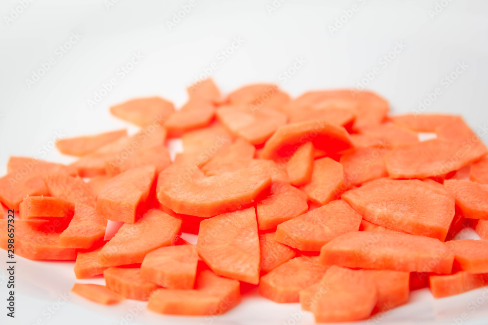 Slices of fresh ripe carrots on a white background isolate Slices of fresh ripe carrots on a white background isolate