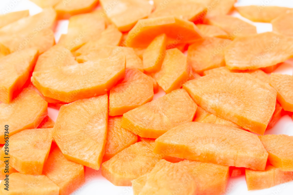 Slices of fresh ripe carrots on a white background isolate Slices of fresh ripe carrots on a white background isolate
