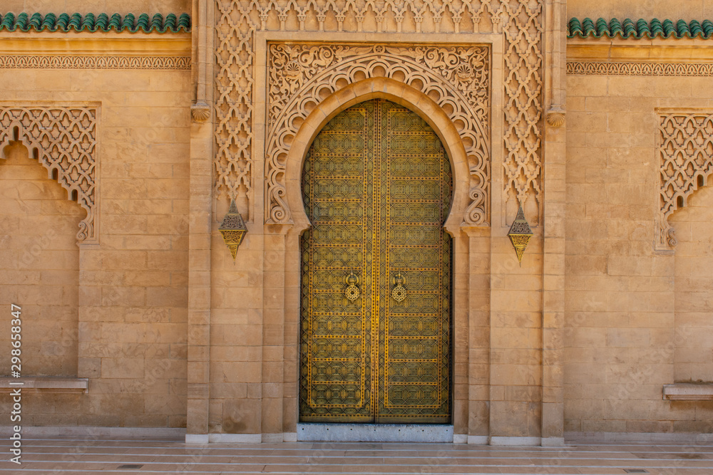 Traditional Moroccan oriental style entrance doors with mosaic colors in Marrakesh, Morocco 