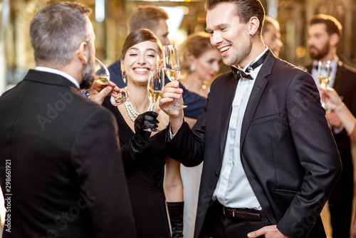 Photos Elegant people during a celebration indoors