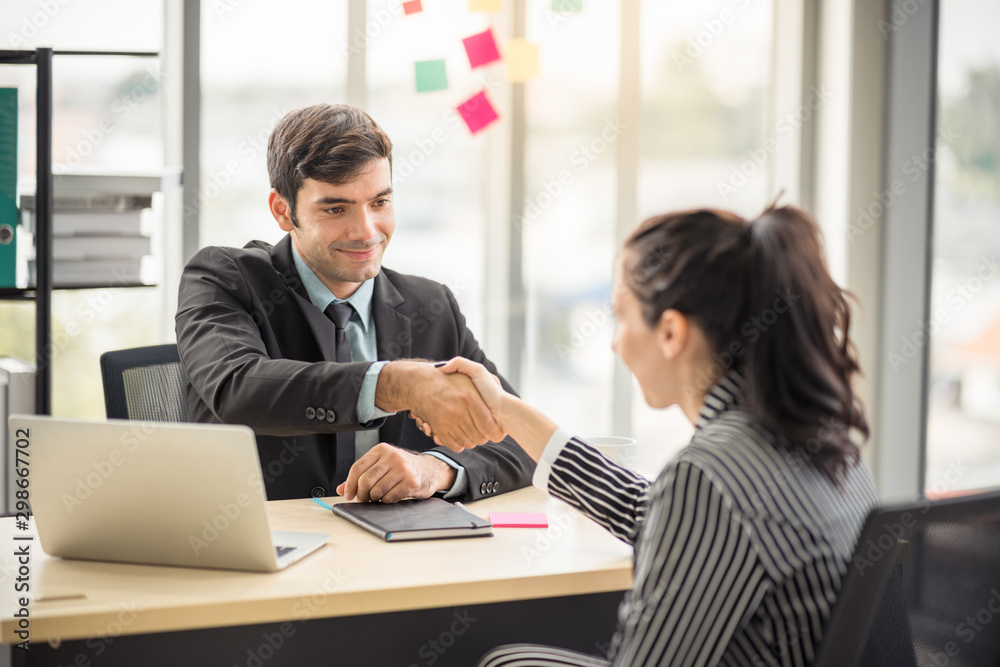 Business team handshake and working in office with laptop using as background professional team, successful business coworker consultant concept. Business team handshake and working in office with laptop using as background professional team, successful business coworker consultant concept.