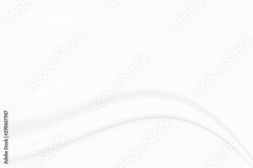 White cloth background with soft waves.