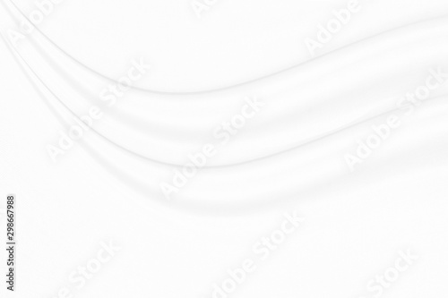 White cloth background with soft waves.