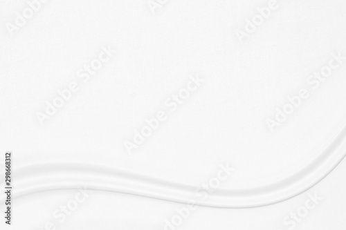 White cloth background with soft waves.