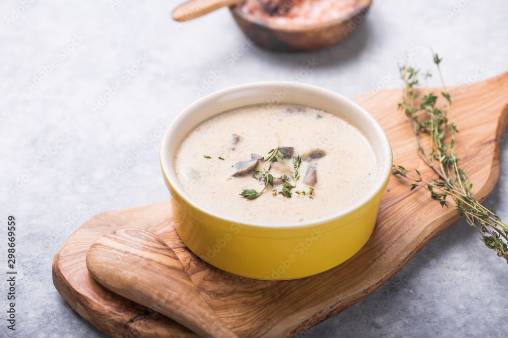 A bowl of delicious homemade cream of mushroom soup. A bowl of delicious homemade cream of mushroom soup.