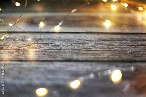 Christmas light on wood background,