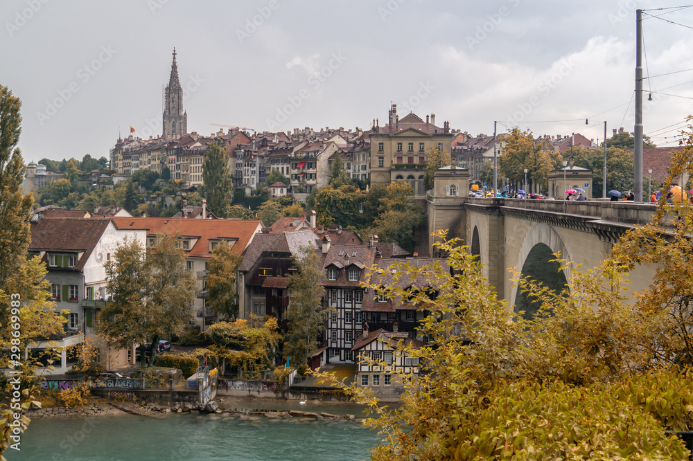 Bern, Switzerland. View of the old city and Nydeggbrucke bridge over Aare river