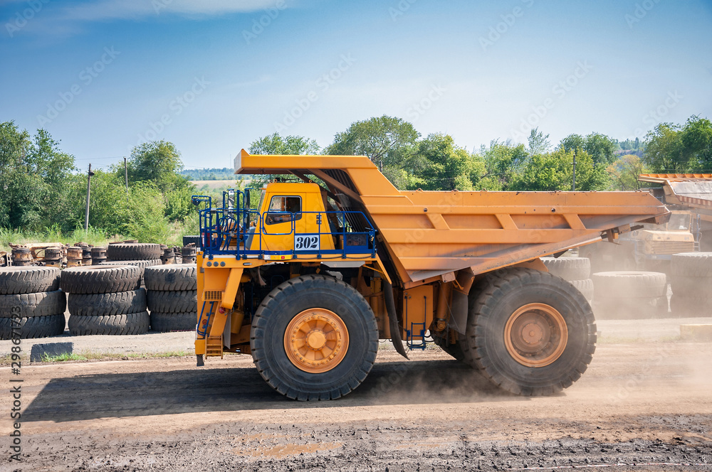 Quarry truck drives alone industrial area