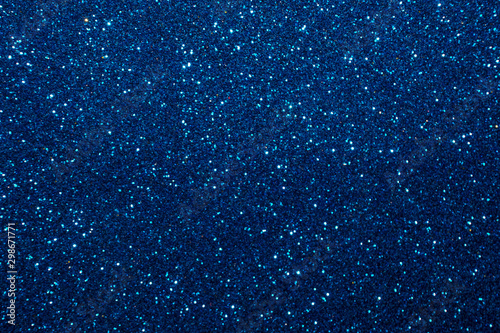 blue Sparkling Lights Festive background with texture. Abstract Christmas twinkled bright bokeh defocused and Falling stars. Winter Card or invitation	 photo