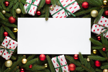 Christmas decoration with fir branches frame and gift
