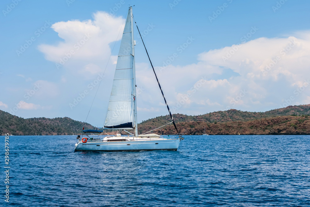 ship white sails a yacht in the Aegean Sea ship white sails a yacht in the Aegean Sea