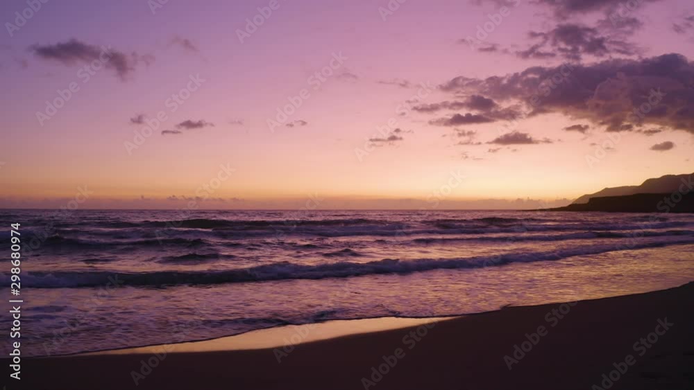 Aerial view of Romantic Evening in the Sea. Flying over beach at Purple Sunset. Beautiful landscape at Dusk Aerial view of Romantic Evening in the Sea. Flying over beach at Purple Sunset. Beautiful landscape at Dusk