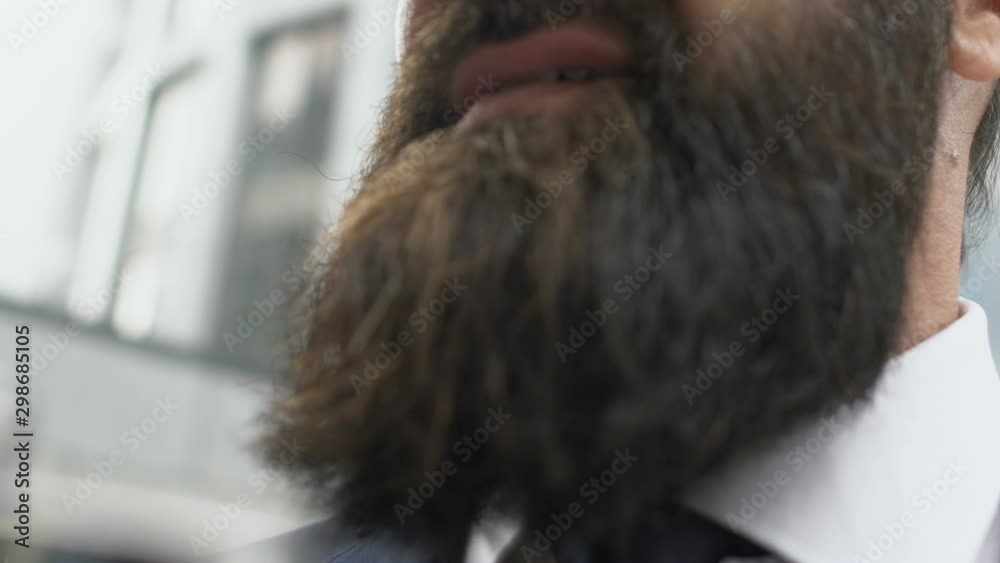 Bearded male boss drinking alcohol flask after hard workday, addiction concept
