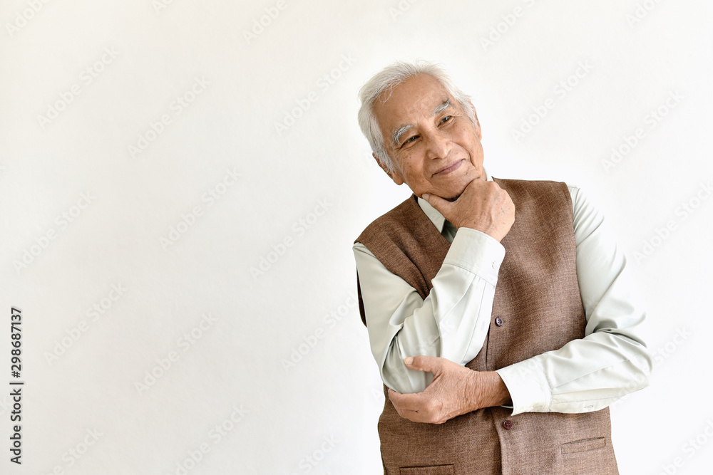 Senior asian old man standing relax, Thinking and smiling elderly people on white background, Positive thinking retiree citizen concept. Senior asian old man standing relax, Thinking and smiling elderly people on white background, Positive thinking retiree citizen concept.