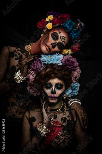 Closeup portrait of female model with a sugar skull makeup