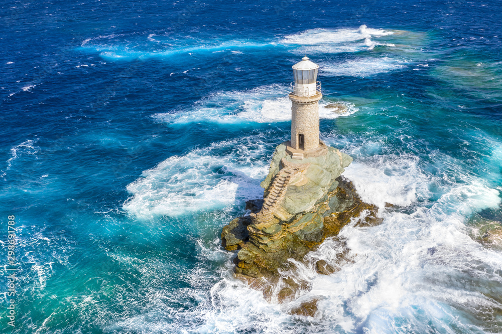 The beautiful Lighthouse Tourlitis of Chora in Andros island, Cyclades, Greece