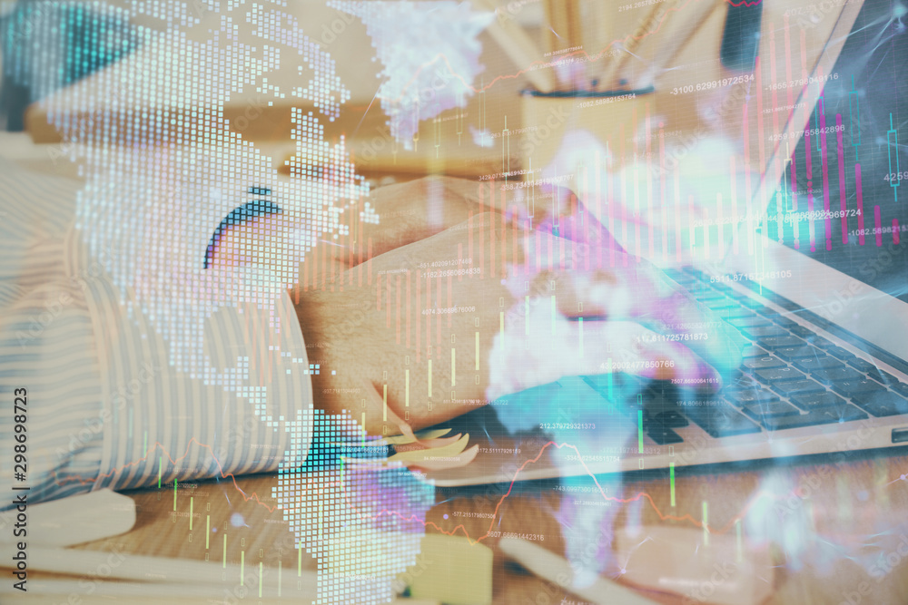 Multi exposure of stock market graph with man working on laptop on background. Concept of financial analysis. Multi exposure of stock market graph with man working on laptop on background. Concept of financial analysis.
