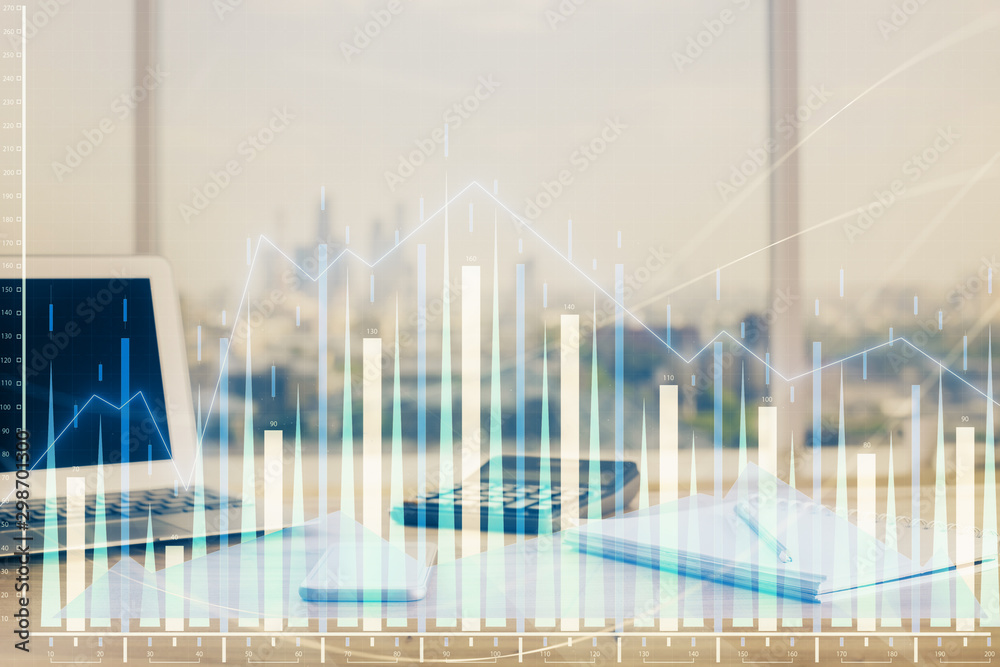 Forex graph hologram on table with computer background. Multi exposure. Concept of financial markets. Forex graph hologram on table with computer background. Multi exposure. Concept of financial markets.