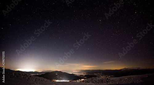 Night view of the ski resort with hills