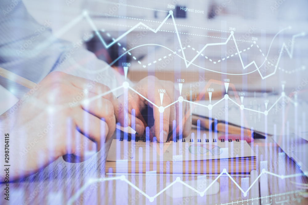 Multi exposure closeup hands with stock market forex graph. Multi exposure closeup hands with stock market forex graph.