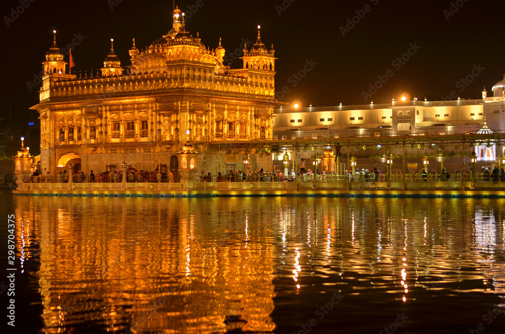 Golden Temple Amritsar Punjab Harmandir Sahib Gurdwara at Night View With Lights. Founded by Guru Nanak Dev, this is world's most holy sikh shrine, and one of the richest indian temples