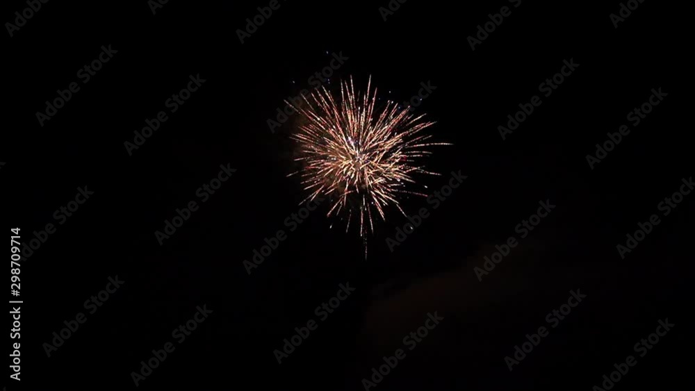 Part of the fireworks bursting on black background on celebration. Part of the fireworks bursting on black background on celebration.