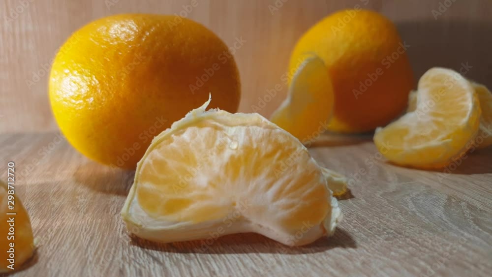 Fresh tangerines. Slices of tangerines. Orange mandarin. Fresh tangerines. Slices of tangerines. Orange mandarin.