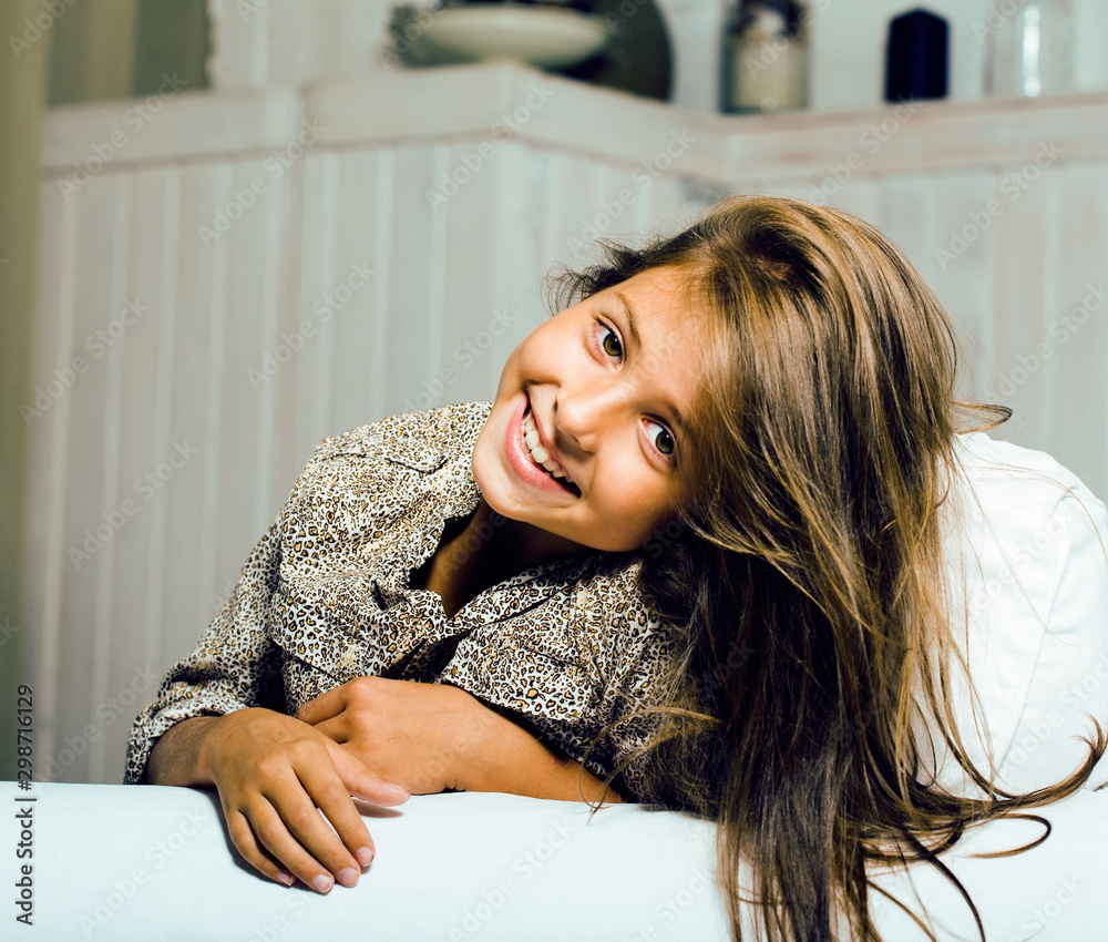 little cute brunette girl at home interior happy smiling closeup, lifestyle  real modern people concept Stock Photo | Adobe Stock