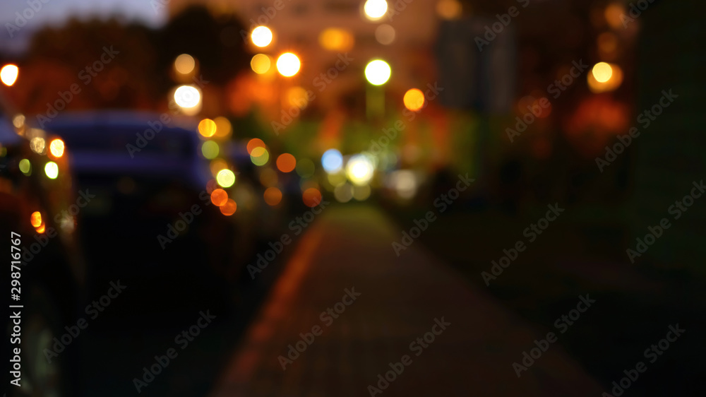 bokeh light blurred night background city nightlife car parking roadside