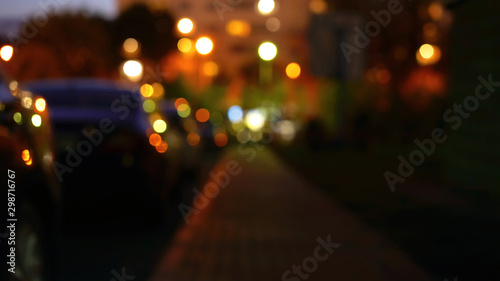 bokeh light blurred night background city nightlife car parking roadside