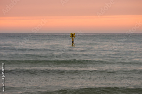 Baltic sea coast, Poland, special mark (sea mark) indicating underwater rocks © tomeyk