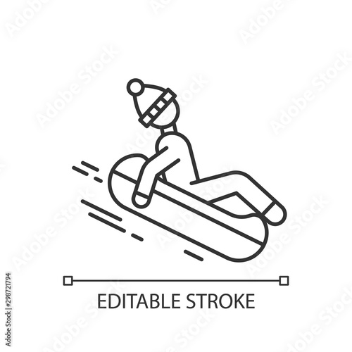 Snow tubing linear icon. Thin line illustration. Winter extreme sport, risky activity and adventure. Cold season outdoor leisure for children. Vector isolated outline drawing. Editable stroke