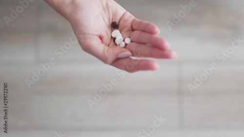 Prescription aspirin and paracetamol prescribed by a doctor during the period of illness. Emergency drugs in a female hand