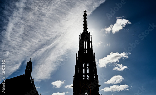 Canvas Print Building Steeple and Church Tower Silhouette against Sunny Blue Sky with Wispy C